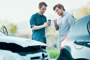 two men in a fender bender