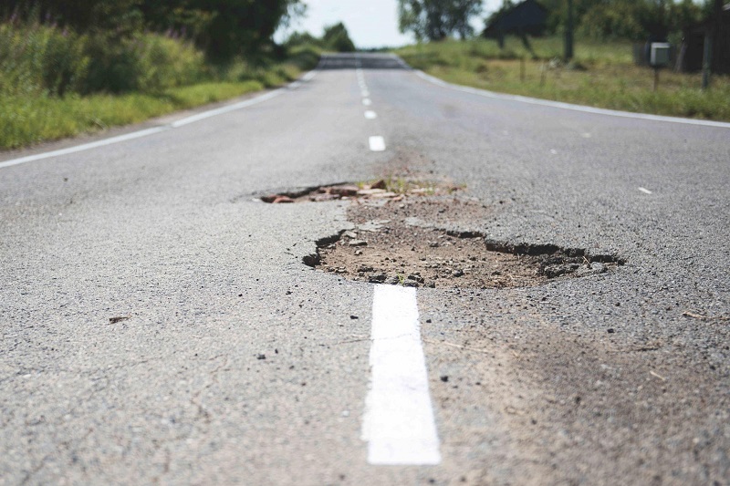 the-guide-to-a-pothole-damage-claim-for-texas-drivers