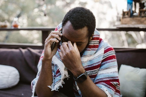 Man-Speaking-To-Auto-Insurance-Company-On-The-Phone