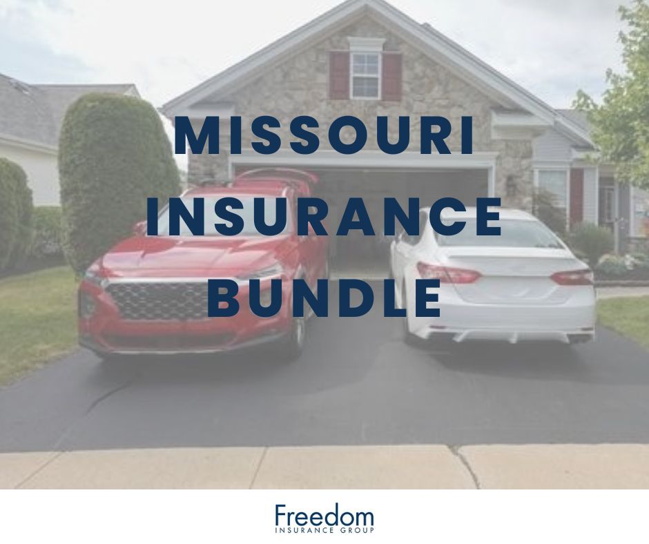 Two vehicles, a red SUV and a white car in the driveway of a single family home in Missouri.