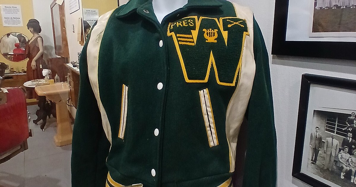 An original green sweater of Weslaco High School, as purple was not introduced until 1967. WHSGreen