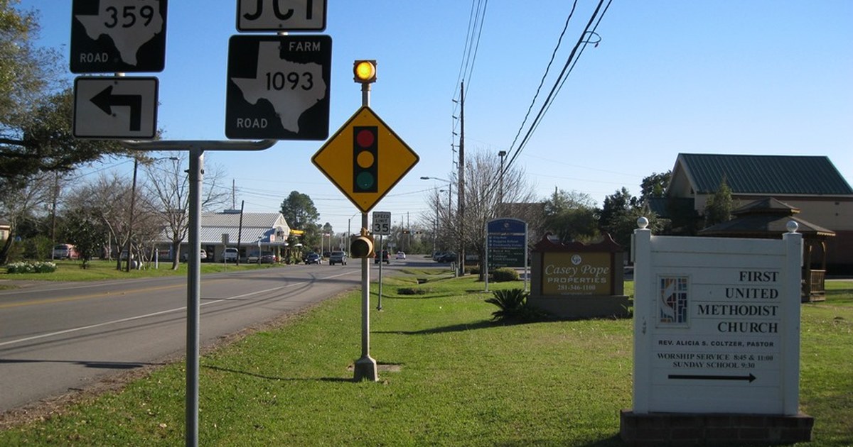 Photo shows FM 359 in Fulshear, Texas. View is south toward the traffic light at FM 1093. Fulshear TX FMs 359 and 1093