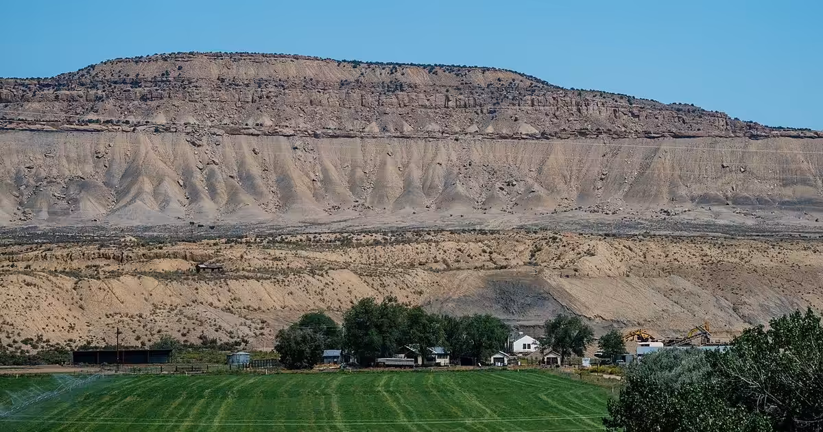 Agricultural land and mountains in Rangely, Colorado, as seen on August 24, 2026. Farm Land in Rangely, Colorado