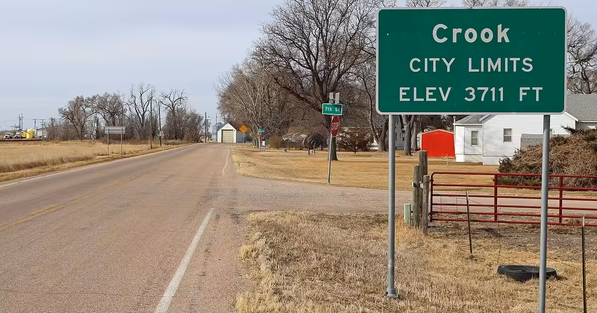 Crook, Colorado. The view is of Crook's city limits sign along U.S. Route 138. Crook, Colorado