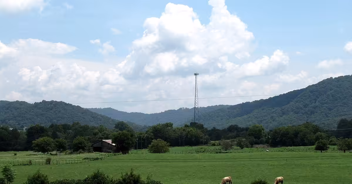 Pasture and mountains in the Mooresburg community of Hawkins County, Tennessee, United States. Mooresburg-pasture-tn1